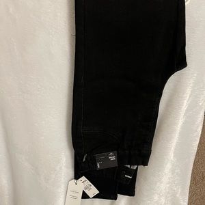 Express skinny jeans. Color is distressed black. Size small.